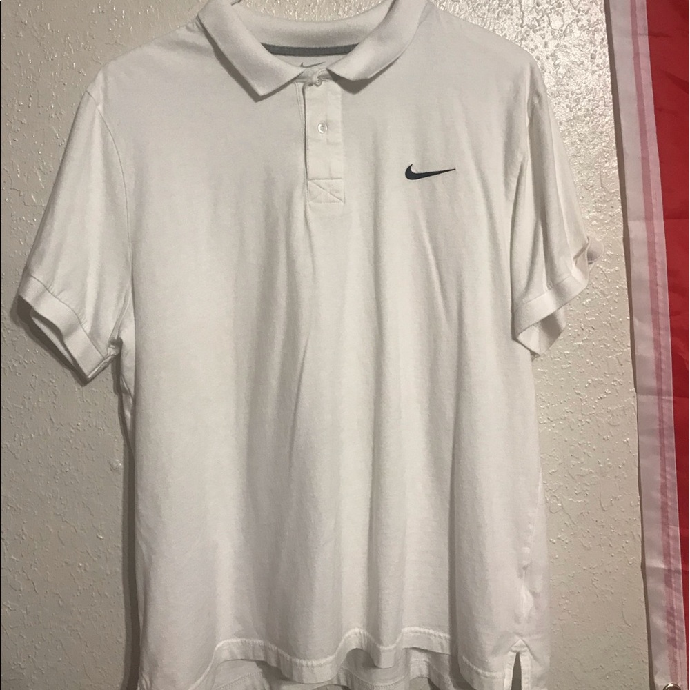 white “nike” polo shirt